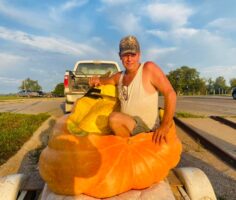 Duane Hansen in pumpkin boat