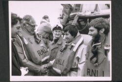 Walmer station. ON 1024 Rother class, 37-32 The Hampshire Rose. Archbishop of Canterbury, Dr. Robert Runcie meeting Cox. and lifeboatcrew. Left to right Head Launcher Les Coe and crew Denis Brophy and Paul Johnson.