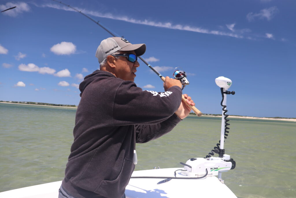 Man fishing with Rhodan integration motor troller