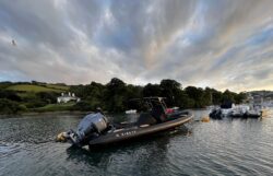 RIB on the water at sunset