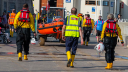 Volunteer crew of Bridlington RNLI returning after paddleboard launch credit Mike Milner