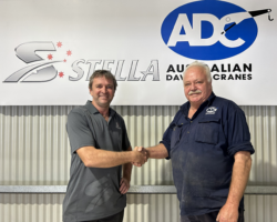 Two men shaking hand confirm the business handover