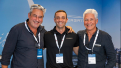 Three men in smart shirts with blue background