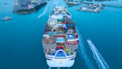 rear view of Icon of the Seas biggest cruise liner in world sailing into Miami