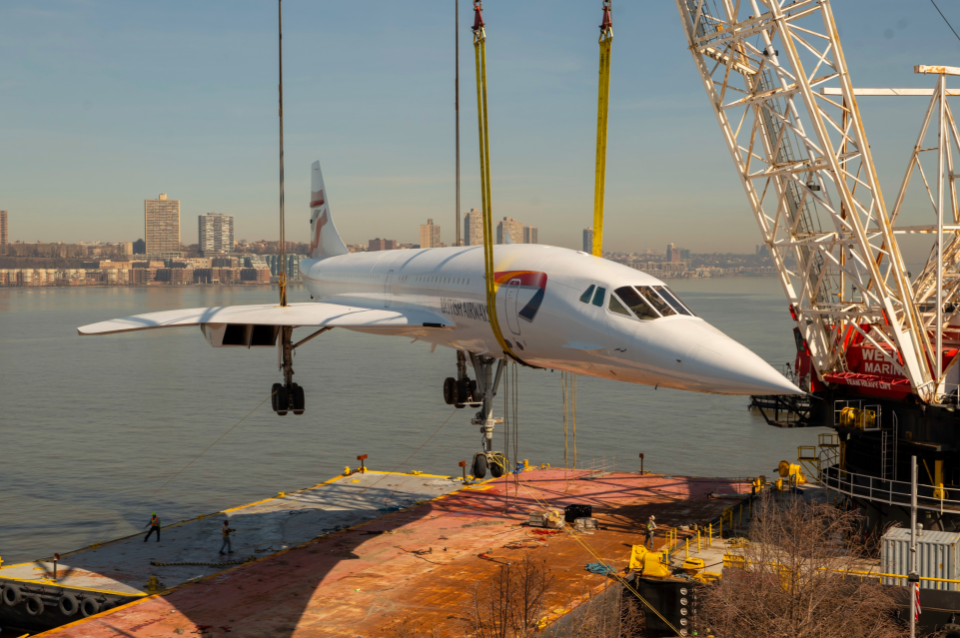 Concorde being lifted in a sling - looking perilous