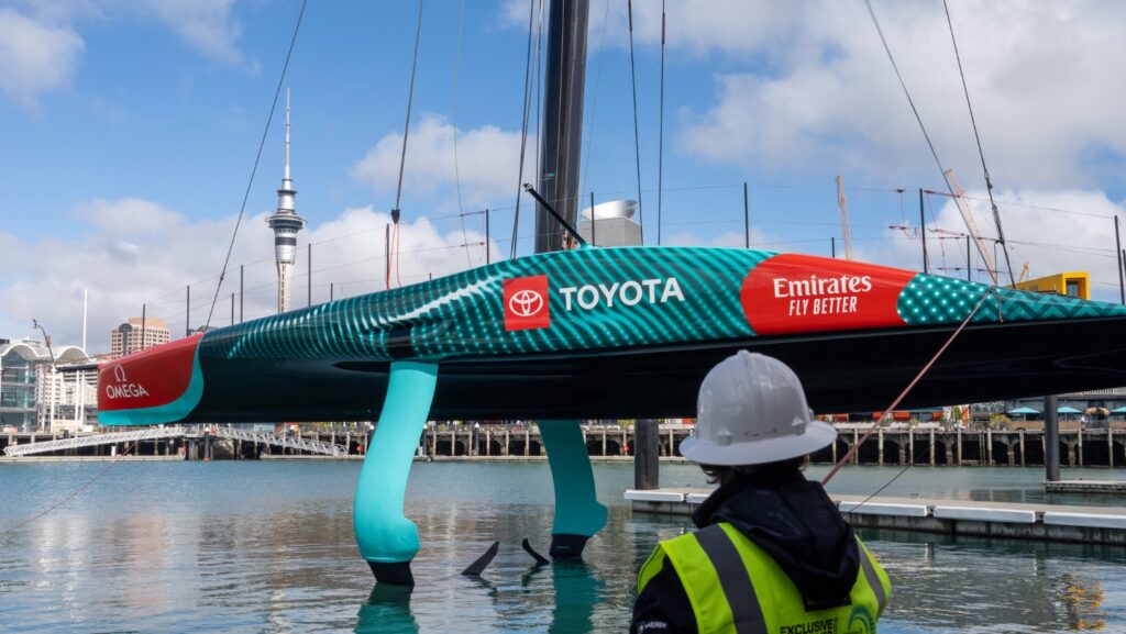 Emirates Team New Zealand new AC75 is rolled out of the shed for the first time in preparation for commissioning.